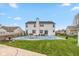 Spacious backyard with lush green grass and pool view at 15885 Symphony Blvd, Noblesville, IN 46060