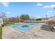 Backyard pool and lounging area with lounge chairs and a clear blue sky above at 15885 Symphony Blvd, Noblesville, IN 46060