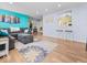 Spacious living room with hardwood floors and colorful accents, perfect for relaxing at 1683 Sweetwater Ln, Greenfield, IN 46140