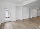 Bright room with hardwood floors and access to an enclosed patio area at 16955 Cole Evans Dr, Noblesville, IN 46060