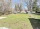 Large grass backyard with chain link fence at 2406 E 10Th St, Anderson, IN 46012