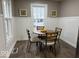 Cozy dining area featuring a round table, comfortable seating, and natural light at 2406 E 10Th St, Anderson, IN 46012