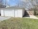 Detached white one car garage at 2406 E 10Th St, Anderson, IN 46012