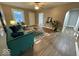 Inviting living room with stylish décor, comfortable seating, and ample natural light at 2406 E 10Th St, Anderson, IN 46012