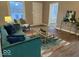 Inviting living room with stylish décor, comfortable seating, and ample natural light at 2406 E 10Th St, Anderson, IN 46012