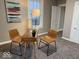 Home office featuring a wooden desk, chairs, decor, and soft light through window at 2406 E 10Th St, Anderson, IN 46012