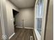 Utility room with window and new flooring at 2406 E 10Th St, Anderson, IN 46012