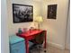 Fun bedroom with a small red desk, modern art and a blue mini-refrigerator at 2460 Collins Dr, Westfield, IN 46074