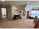 Spacious bonus room offering versatile living with a dedicated music listening space at 2460 Collins Dr, Westfield, IN 46074