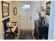 Inviting entryway featuring hardwood floors, elegant furnishings, and decorative artwork at 2460 Collins Dr, Westfield, IN 46074