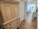 Hallway view into the bedroom showcasing the hardwood floors and stylish furnishings at 2460 Collins Dr, Westfield, IN 46074