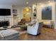 Spacious living room with fireplace, hardwood floors, and ample seating at 2460 Collins Dr, Westfield, IN 46074