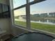 Bright room with views of the water and a tranquil fountain at 2460 Collins Dr, Westfield, IN 46074