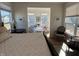 Cozy sitting area in the main bedroom with natural light and stylish decor at 2460 Collins Dr, Westfield, IN 46074