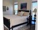 Well-appointed main bedroom featuring views of the adjacent pond and elegant furnishings at 2460 Collins Dr, Westfield, IN 46074