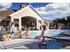 Luxury pool area at the clubhouse with beautiful views, tanning deck, and various seating arrangements at 2460 Collins Dr, Westfield, IN 46074