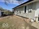 View of the backyard and the side of the single-Gathering home at 2750 Kristen E Dr, Indianapolis, IN 46218