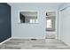 Dining area showcasing an open layout with hardwood floors and a view into the living area at 2750 Kristen E Dr, Indianapolis, IN 46218