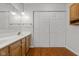 Bathroom features modern wood cabinets, spacious countertop, and stylish fixtures and hardware at 2770 Two Worlds Dr, Columbus, IN 47201