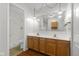 Bright bathroom with double sinks, shower and large mirror at 2770 Two Worlds Dr, Columbus, IN 47201