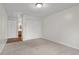 Spacious bedroom with neutral carpet, closet, and overhead lighting at 2770 Two Worlds Dr, Columbus, IN 47201
