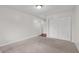 Spacious bedroom with neutral carpet, closet, and overhead lighting at 2770 Two Worlds Dr, Columbus, IN 47201