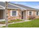 Charming single-story brick home featuring white trim and a well-maintained lawn at 2770 Two Worlds Dr, Columbus, IN 47201