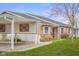Charming single-story home with a carport, brick facade, and well-maintained landscaping at 2770 Two Worlds Dr, Columbus, IN 47201