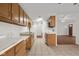 Kitchen with wood cabinets and tile flooring at 2770 Two Worlds Dr, Columbus, IN 47201
