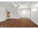 Expansive living room featuring rich hardwood floors and a seamless open layout at 2770 Two Worlds Dr, Columbus, IN 47201