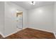 Well-lit living room featuring hardwood floors and neutral paint at 2770 Two Worlds Dr, Columbus, IN 47201