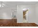 Spacious living room with hardwood floors connected to the kitchen at 2770 Two Worlds Dr, Columbus, IN 47201