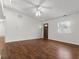 Bright, open living room featuring beautiful dark wood floors and neutral walls at 2770 Two Worlds Dr, Columbus, IN 47201