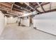 Unfinished basement space with exposed ceiling joists at 3006 W 10Th St, Indianapolis, IN 46222