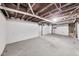 Spacious unfinished basement area with cement walls and floors at 3006 W 10Th St, Indianapolis, IN 46222