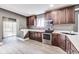 Kitchen featuring stainless steel appliances, and ample counter space, perfect for cooking at 3006 W 10Th St, Indianapolis, IN 46222