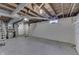 Unfinished basement featuring painted walls and ceiling with open duct work at 319 Alice St, Shelbyville, IN 46176