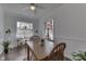 Dining room with hardwood floor, natural light, and view of a beautiful stained glass window at 319 Alice St, Shelbyville, IN 46176