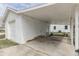 Exterior view of detached garage with open carport showing the open space at 319 Alice St, Shelbyville, IN 46176