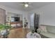 Comfortable living room with hardwood floors, a ceiling fan, tasteful decor, and a view to another room at 319 Alice St, Shelbyville, IN 46176