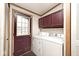 The laundry room features a washer, dryer, and storage at 33 W Mill St, New Palestine, IN 46163