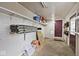 Storage room with shelving and easy access to other areas of the home at 33 W Mill St, New Palestine, IN 46163