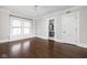 Cozy bedroom boasts detailed trim and has a view into the bathroom at 3447 Washington Blvd, Indianapolis, IN 46205