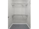 A walk-in closet with white wire shelving and neutral paint at 3447 Washington Blvd, Indianapolis, IN 46205