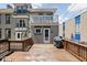 Spacious deck features a grill and a second story balcony at 3447 Washington Blvd, Indianapolis, IN 46205