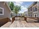 Spacious deck features wood railing and space for entertaining at 3447 Washington Blvd, Indianapolis, IN 46205