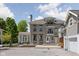 Charming three story home with detailed trim and professional landscaping at 3447 Washington Blvd, Indianapolis, IN 46205