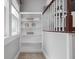 Hallway with custom shelving, offering a stylish storage solution at 3447 Washington Blvd, Indianapolis, IN 46205
