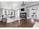 Bright living room with fireplace, hardwood floors, and neutral decor at 3447 Washington Blvd, Indianapolis, IN 46205