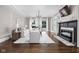 Elegant living room with fireplace, hardwood floors, and neutral color palette at 3447 Washington Blvd, Indianapolis, IN 46205